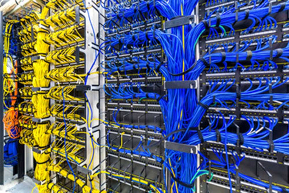 hundreds of well managed cables in data centre